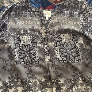 Low hem floral blouse